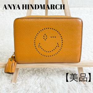 アニヤハインドマーチ　折り財布　ラウンドファスナー　　レザー　チャーム　ANYA HINDMARCH コンパクトウォレット　スマイリー　ウインク