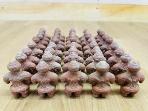  is ..40 piece unglazed pottery objet d'art gardening garden ornament doll earth . shade vessel earth .