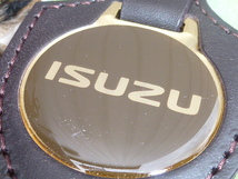 【当時物！】希少 いすゞ 純正キーホルダー ISUZU ギガ 絶版車 117クーペ べレット ジェミニ アスカ ピアッツァ フローリアン いすず絶版車_画像1