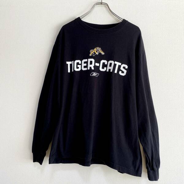 アメリカ古着　CFL　ハミルトン・タイガーキャッツ　長袖　Tシャツ　ロンT　Mサイズ　リーボック　コットン　【P342】