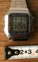 SS-1334■送料込■CASIO ILLUMINATOR ALARM CHRONO WR DUAL TIME 10YEAR BATTERY デジタル腕時計 時計 防水 レトロ 51g●動作品/くATら_画像3