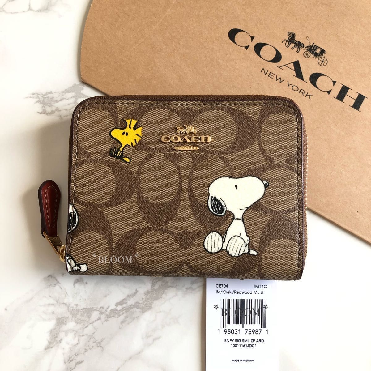 新品未使用 COACH コーチ スヌーピー コラボ 折り財布 人気 完売品-