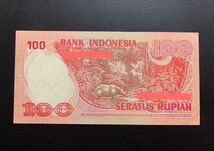 インドネシア　旧紙幣　100 ルピア　1977年　未使用　ピン札Indonesia Rupiah WORLD Paper Money_画像2