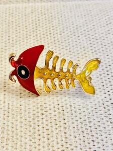  surface white fish . brooch 
