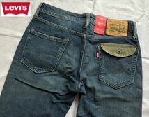 未使用品 Levi's 511 ストレッチ スリムストレート デニムパンツ W30メンズ フラップポケット 140周年スタンプ グリーンパッチ_画像1