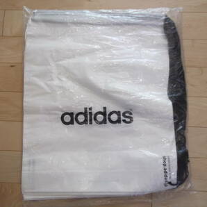 未使用即決 adidasアディダス ノベルティ 大き目ビニールナップサックバッグ 20枚組 58×50×13cm ホワイトの画像1