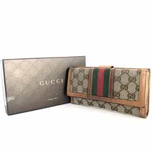 ■良品■GUCCI グッチ　シェリーライン　三つ折り長財布　GGキャンバス×レザー　ブラウン×ベージュ　ゴールド金具　イタリア製　刻印あり_画像1