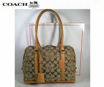 ★ＣＯＡＣＨ　コーチ★とってもお洒落で素敵な♪定番！大人気♪シグネチャー柄ショルダーバッグ■チャームプレート＆キークロシェット付■_画像1