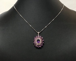 10K WG mites blue b New York amethyst color stone diamond pendant 