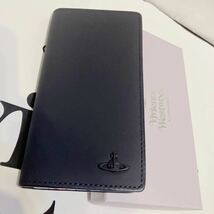 送料込●新品●箱付 価14300円 Vivienne Westwood スマホケース 紺J iPhone7 8 SE2 3同等サイズ対応 ワールドトラベル 手帳型 ヴィヴアン_画像1