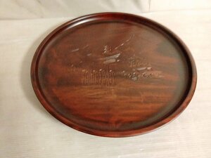 . island carving. circle tray reverse side . memory. character equipped 