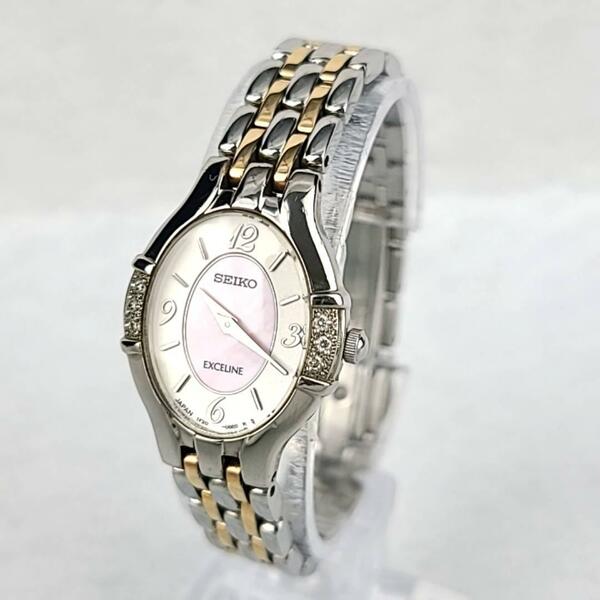 □【美品稼働品】SEIKO セイコー エクセリーヌ 1F20-0AW0 ダイヤベゼル オーバル 6Pダイヤ シェル文字盤 レディース腕時計