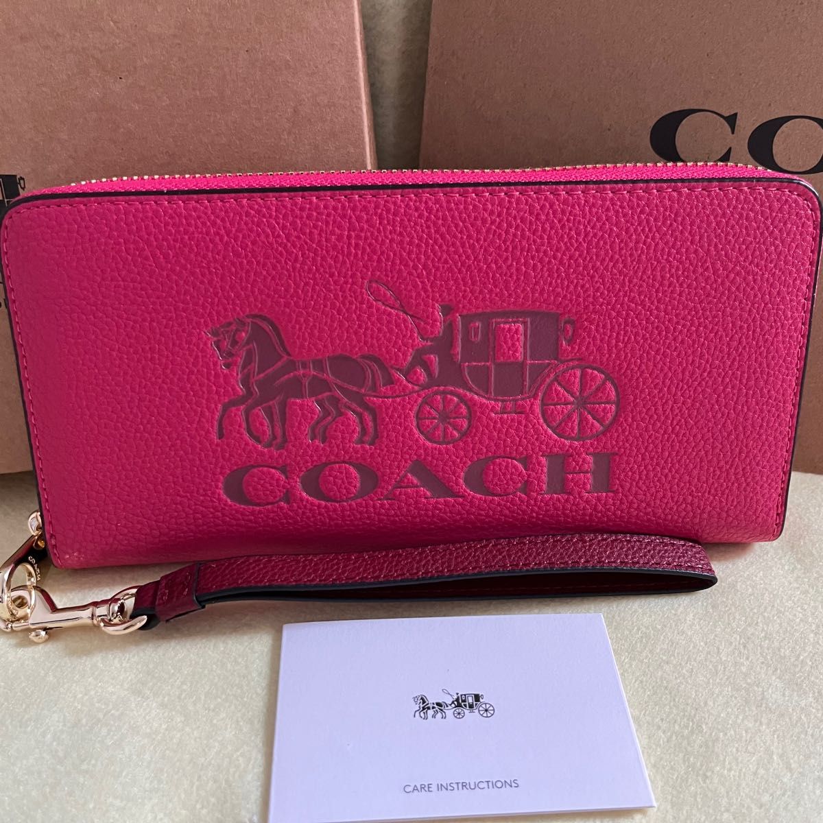 COACH コーチ 馬 アイコン ピンク ラウンドファスナー ストラップ