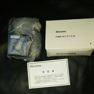 docomo/ original AC adapter 02( unused storage goods ) present condition reality goods delivery / original box go in ( that time thing ;)