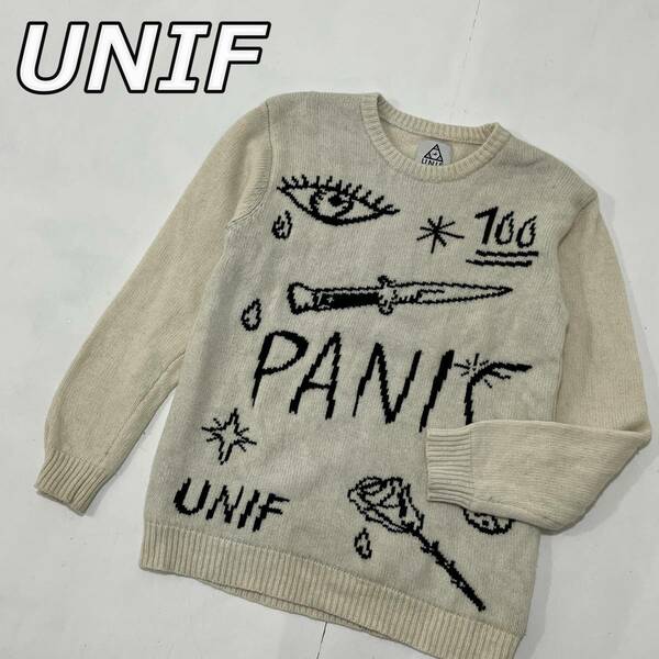 【UNIF】ユニフ PANIC アート ロゴ ナイフ バラ クルーネック 長袖 ウール ニットセーター 生成り オフホワイトカラー