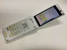 AD392 docomo P-01B ホワイト ジャンク_画像1