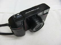 1985年発売 ミノルタ Minolta AF-Tele QUARTS DATE STANDARD 38mm TELEPHOTO 60mm ストラップ付 動作未確認_画像3