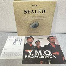 YMO SEALED 写真集 プロパガンダ映画チラシ付属（イエロー・マジック・オーケストラ 坂本龍一 高橋幸宏 細野晴臣）_画像1