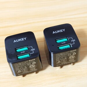 [ postage 185 jpy ]AUKEY USB charger 2 piece set AC adaptor white 2 port microminiature folding type light weight compact AiPower function installing mobile light weight 