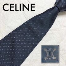 ■美品■現行■CELINE セリーヌ　ネクタイ　ロゴ総柄　レジメンタルストライプ　シルク100% イタリア製　ブルー系_画像1