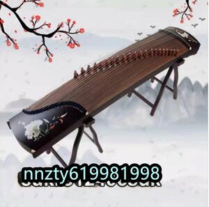  old koto . tree on ..? hand . body . taking . industrial arts Lotus common carp stringed instruments 