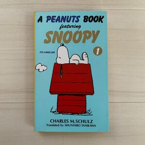 A peanuts book featuring Snoopy 1