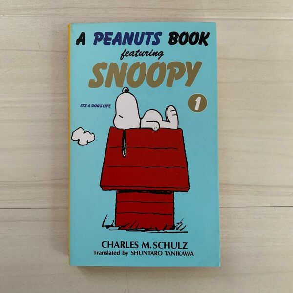 A peanuts book featuring Snoopy 1