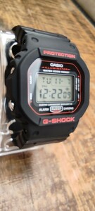 CASIO G-SHOCK 未使用 DW-5600E 赤ロゴ海外版200M表記 ベルト一部が布製