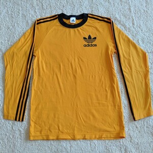 む117 adidas サイズS-M ロングTシャツ 綿 オレンジ デサント トレフォイル アディダス スリーストライプ 洋服