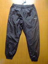 オークリー メンズXL 黒 ウインド 撥水 保温 JOGGER FIT 401616 新品 定価9350_画像1