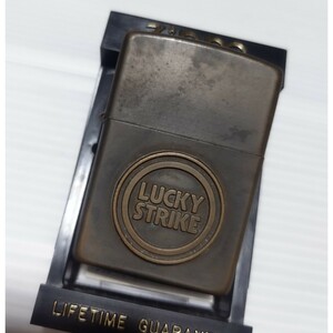 1円スタート　ZIPPO 　LUCKYSTRIKE　ラッキーストライク　立体ロゴ　燻しゴールドカラー　1994年製