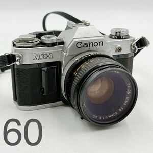 11AD121 Canon キャノン AE-1 フィルムカメラ LENS FD 50mm 1:1.8 S.C. 中古 現状品