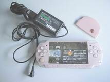 【動作品】SONY PSP-2000 本体 ピンク + ACアダプター + 32MBメモリー + モンハン2G ソフトのみ 一部難あり_画像1