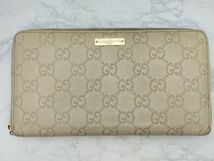 P8 1円～ 中古品※難あり グッチ GUCCI 長財布 ラウンドファスナー 二つ折り GG柄 ベージュ系カラー レザー レディース メンズ 箱付き_画像2