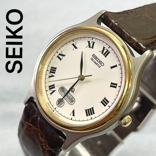 稼働　美品　SEIKO メンズ腕時計　クォーツ　ローマン　曜日　デイト　クラシック　ビンテージ　セイコー　SQ コンビ