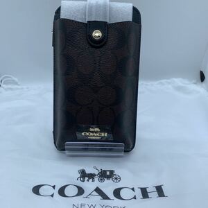 新品未使用　COACH スマホショルダー 大人気！ ブラック＆ブラウン C7397