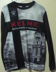 美品　KELME【ケルメ：トータス(株)】製2018PASIONロングＴシャツ(長袖練習着プラクティス)　S　黒　KPW032C　海外街風景(建物)柄