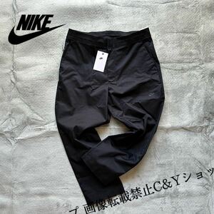 格安送料 Lサイズ （ 32 ）新品 NIKE ナイキ クロップドパンツ チノパン テーパードパンツ ロゴ プリント 黒 ブラック 薄手 DD7033-010