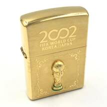 11.23TE-E858★訳アリ! ZIPPO 2002 FIFA WORLD CUP KOREA/JAPAN★ジッポ ジッポー ゴールドカラー オイルライター lighter 喫煙具 DA5/dF0_画像1