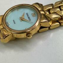 【TS1120】ニナリッチ Nina Ricci 腕時計 不動 D953 ゴールドカラー シェル文字盤？ ブルーカラー レディース コレクション クォーツ _画像3