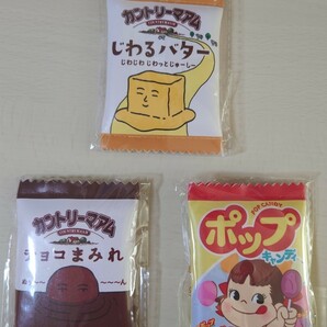 お菓子シリーズ フラットミニポーチ 3点セット ポップキャンディ・チョコまみれ・じわるバター カントリーマアム 新品タグ付き 