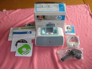 HP Photosmart A528 compact photoprinter -( unused . close with translation )