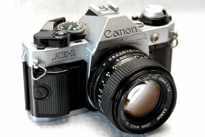 Canon キャノン人気の高級一眼レフカメラAE-1PROGRAMボディ + 純正50mm単焦点レンズ1:1.4付 希少な作動品 （鳴きなし）（腐食なし）