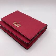 □5532　ケイトスペード KATE SPADE 二つ折り財布 濃いピンク 系　 財布　小銭入れ　カード入れ　パスケース_画像4