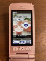 【美品】 ドコモ docomo F-01M らくらくホン ピンク　動作品 純正卓上ホルダ付き_画像2