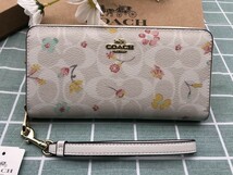 COACH コーチ 財布 長財布 プレゼント 花柄 ホワイト 贈り物 レザー ウォレット ラウンドファスナー 新品未使用 ロゴ シグネチャー A101_画像1