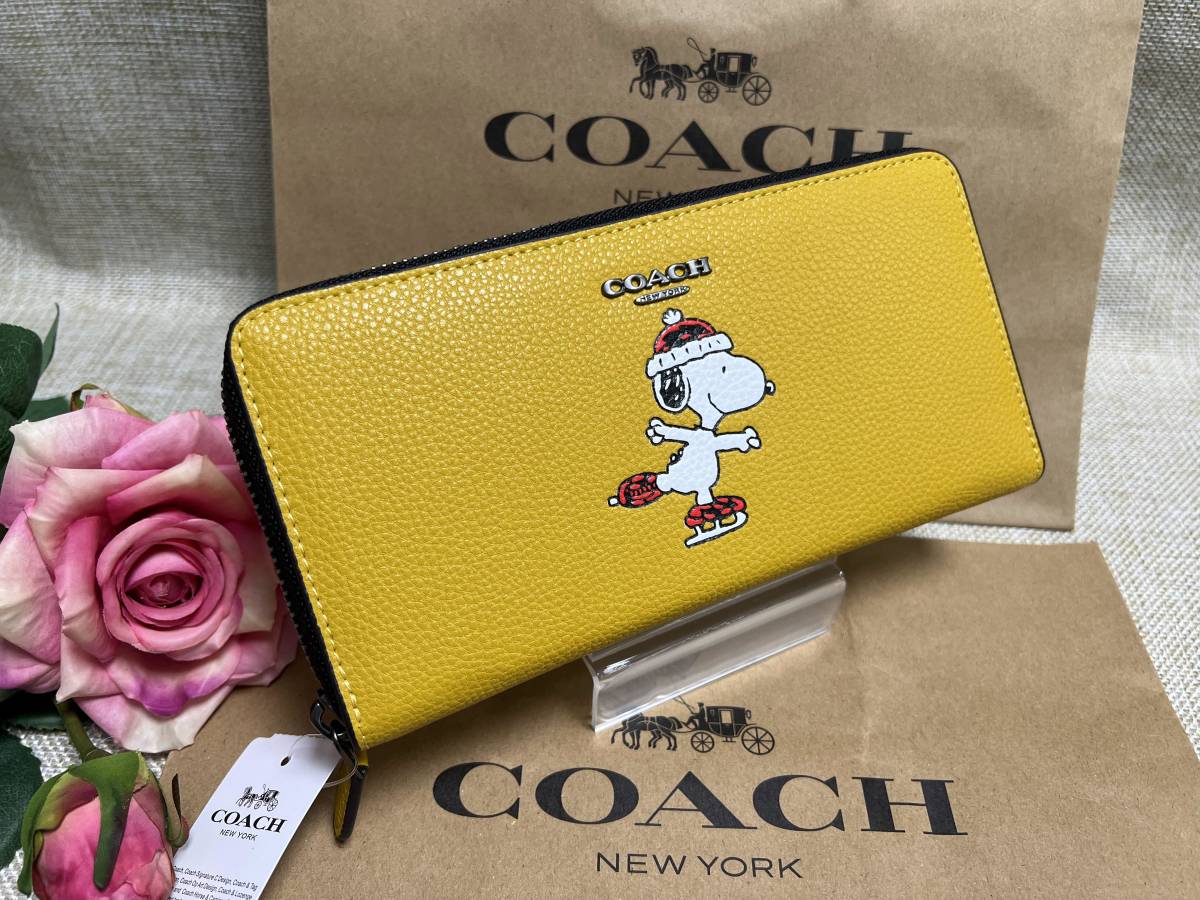 COACH 長財布（アコーディオン ウォレット）／おしゃれなイエロー 家庭