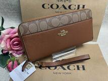 コーチ COACH 長財布 財布 シグネチャー ラウンドファスナー ラグジュアリー アコーディオン ジップ 長財布 レディース 新品 F76971 C200_画像1