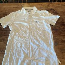 正月価格・１円スタート・良品・アルマーニ・コレッツオーニのロゴ入・シンプルで流行のタイトな・ホワイト・半袖ポロシャツ_画像1