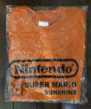 激レア 20年以上前 当時物 Nintendo スーパーマリオサンシャイン Tシャツ 非売品 オレンジ色 任天堂 ニンテンドー ゲームショウ_画像1